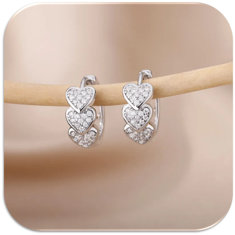 Women’s Silver-Tone Earrings with Three Vertically Aligned Hearts. (LFA1422009)