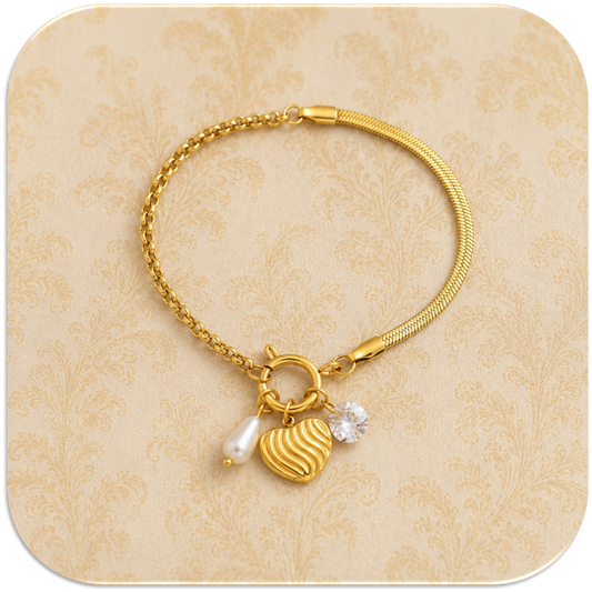 Women's Gold-Plated Bracelet with Mixed Chain Design, featuring Heart, Pearl, and Zirconia Charms. (LFA1211011)