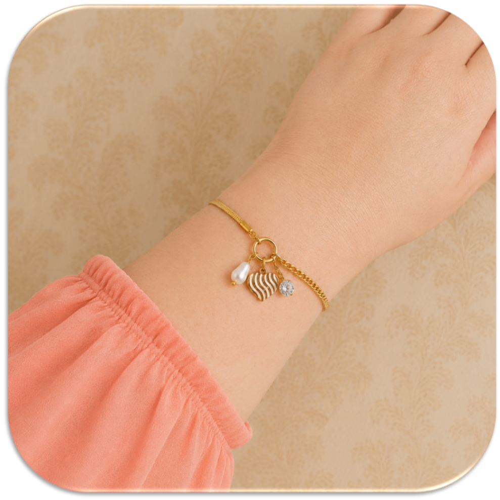 Women's Gold-Plated Bracelet with Mixed Chain Design, featuring Heart, Pearl, and Zirconia Charms. (LFA1211011)
