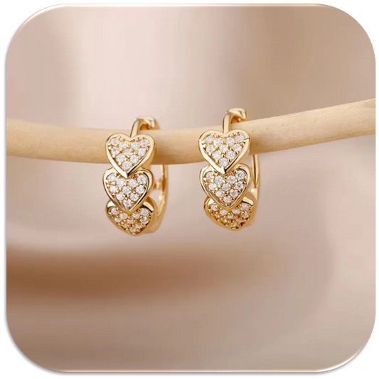 Women’s Earrings with Three Vertically Aligned Hearts. (LFA1421010)